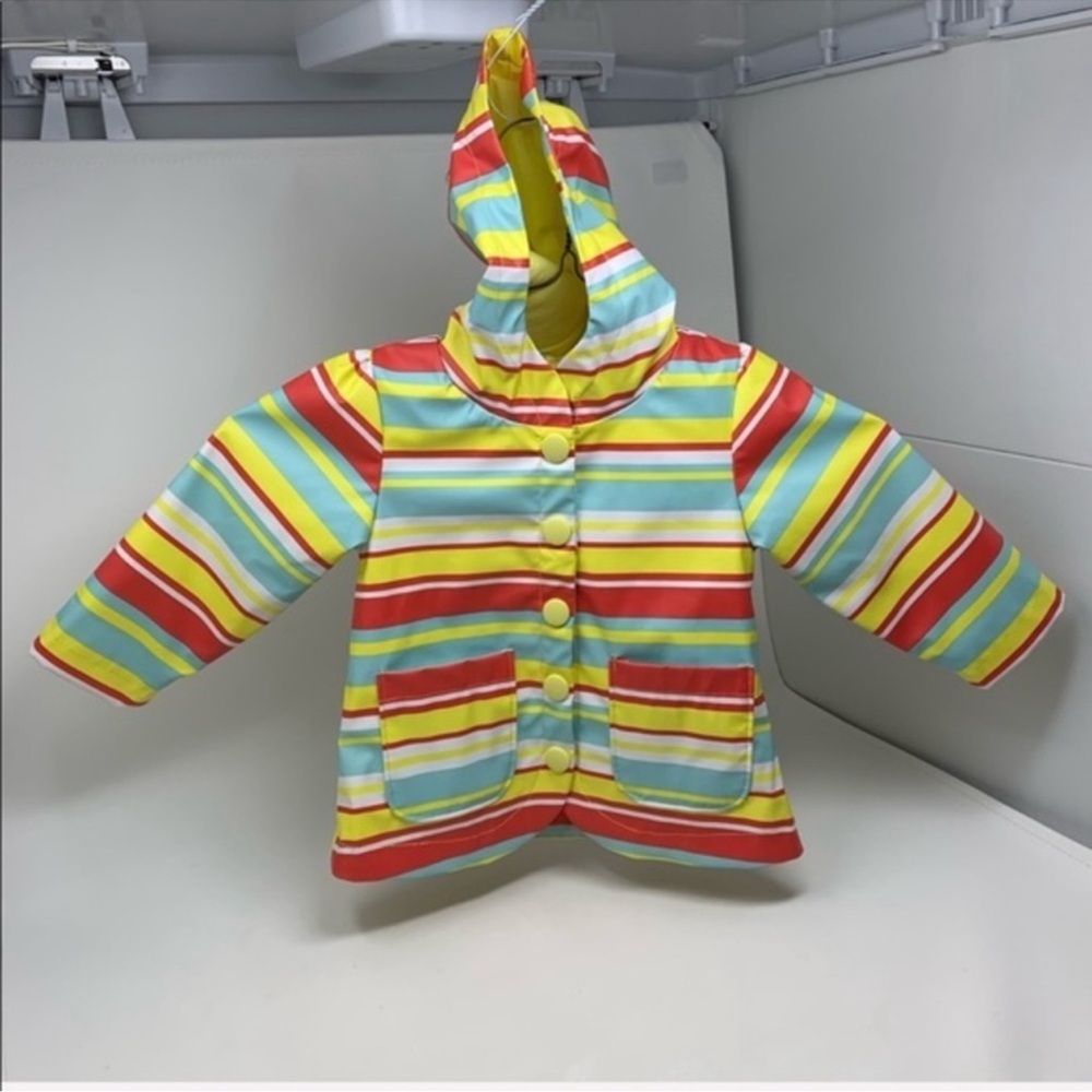 NWOT! SOFT Cherokee Raincoat with Hood and pockets, snap button closure!